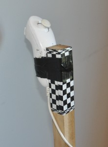 Sophisticated steering mechanism - a Wii Nunchuck attached to the handle with duck tape.