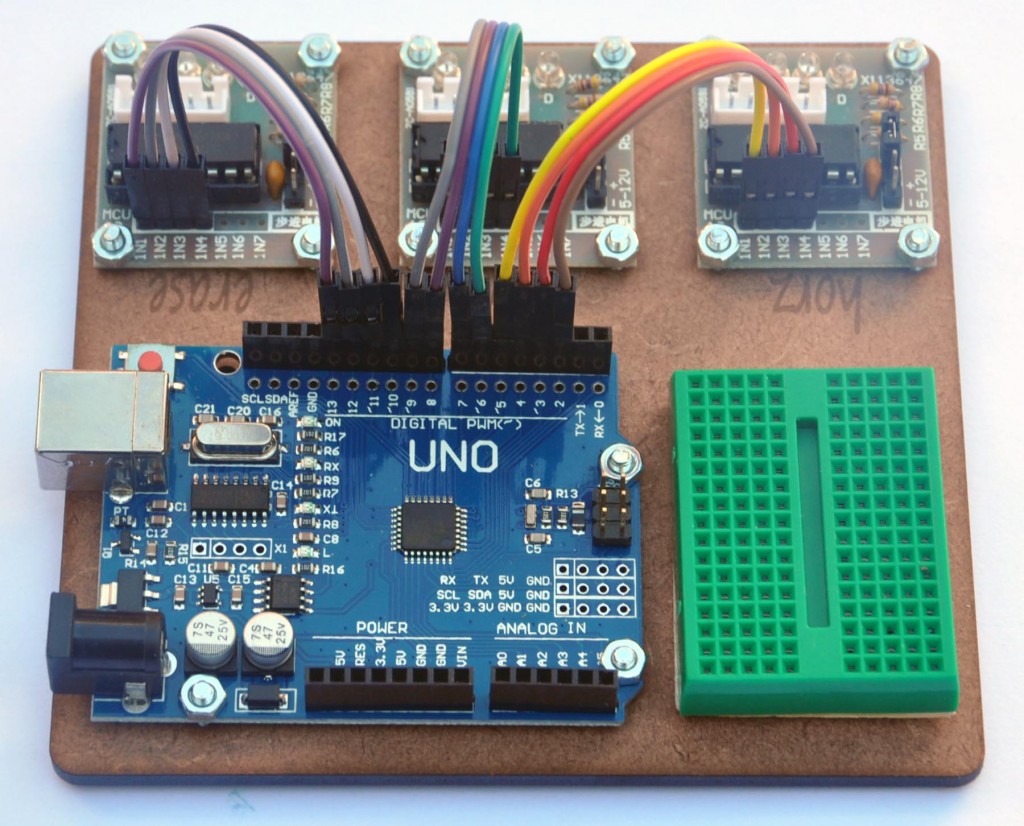 Stepper motor drivers wired to Arduino UNO as shown.