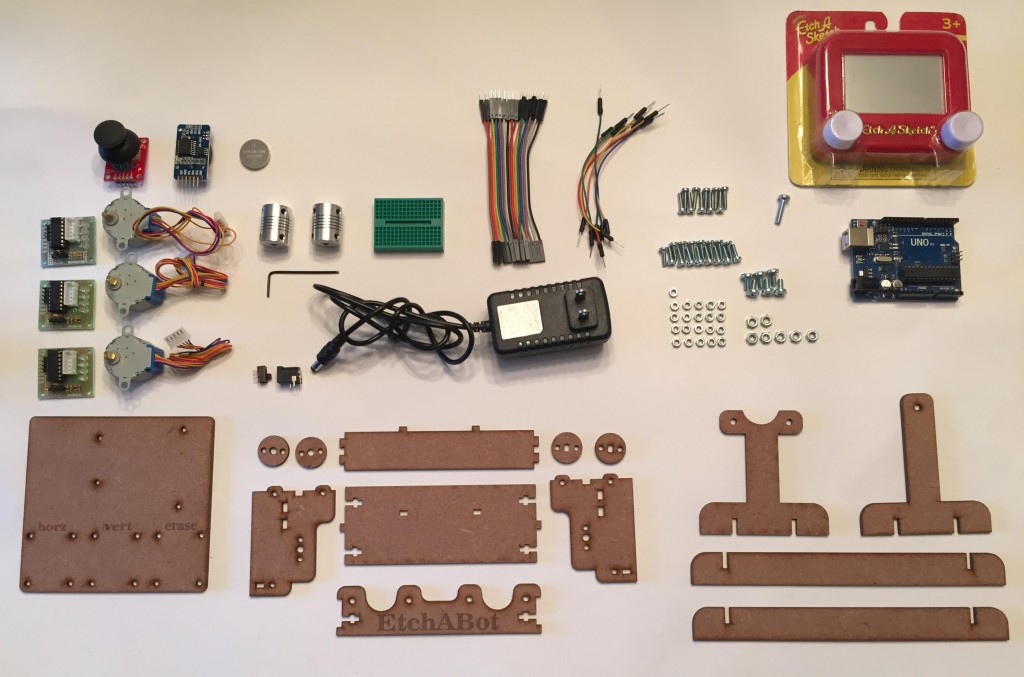 All parts for the EtchABot. The kit does not include the Arduino or the EtchASketch.